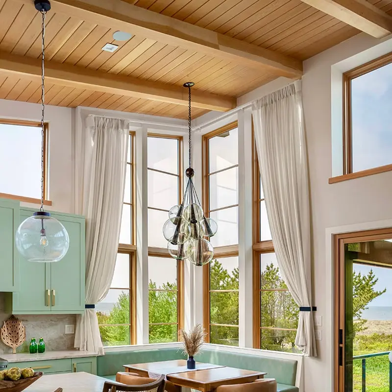 A Series Windows looking out to a costal view