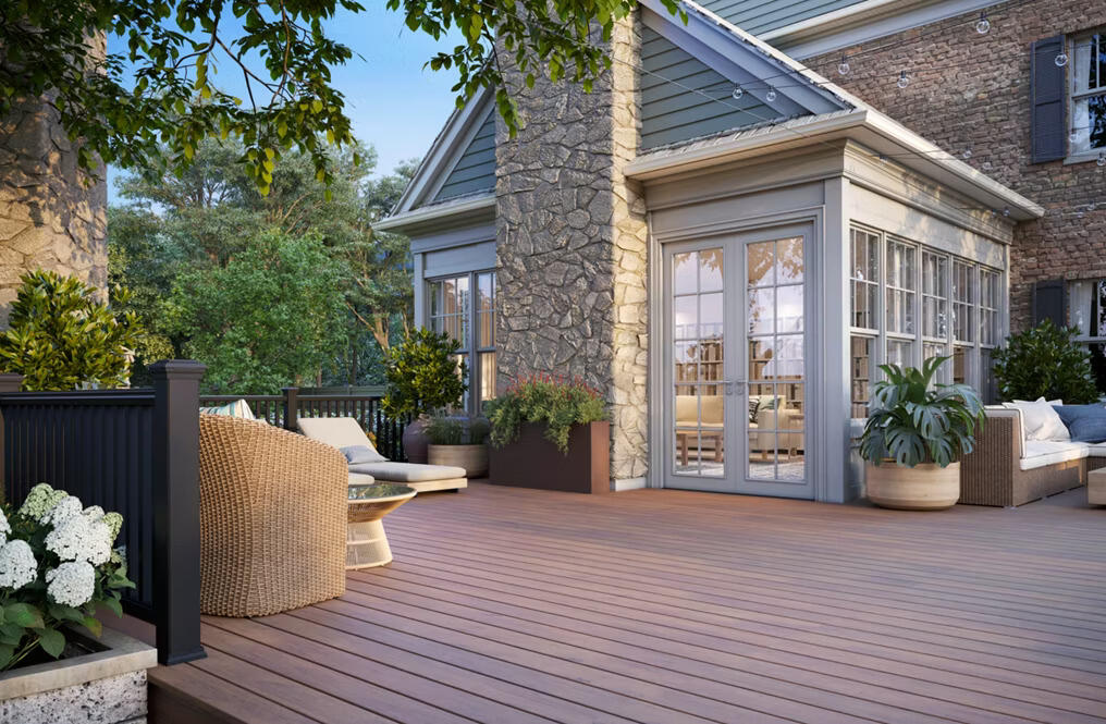 A Sunroom surrounded by Trex Decking
