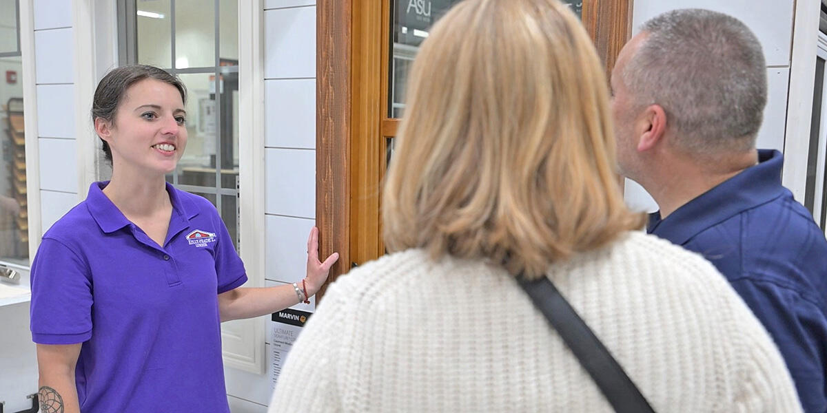 Team member talking to customers