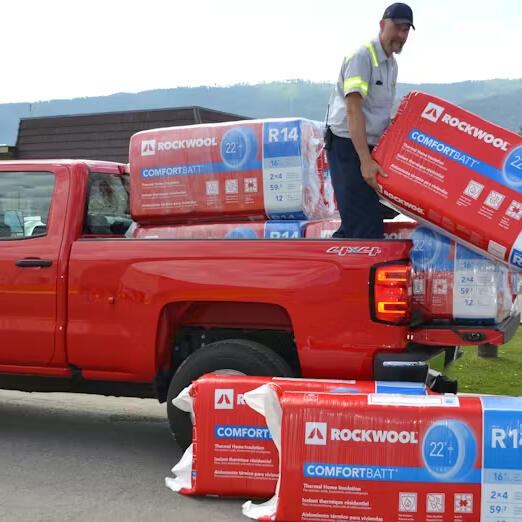 Contractor unloading Rockwool from a truck